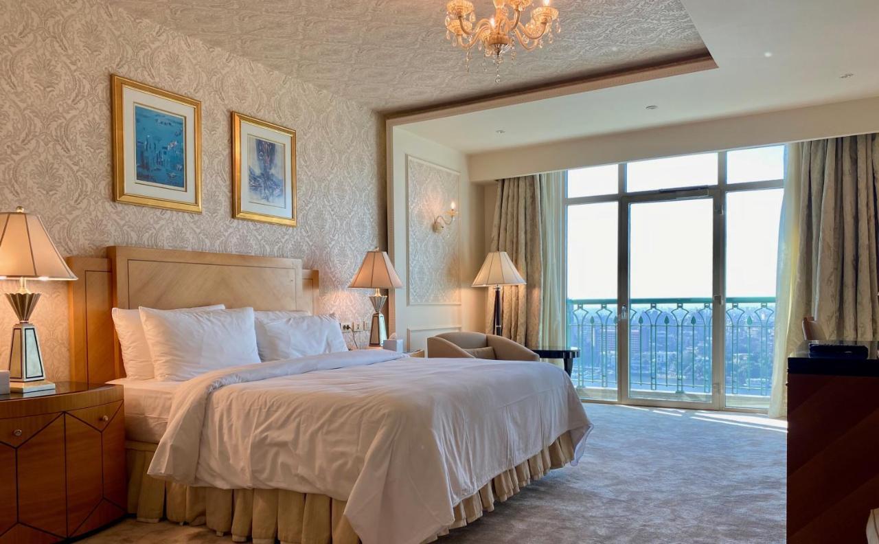 Chez Haytham At Four Seasons Nile Plaza Residential Suite Kairo Exteriör bild